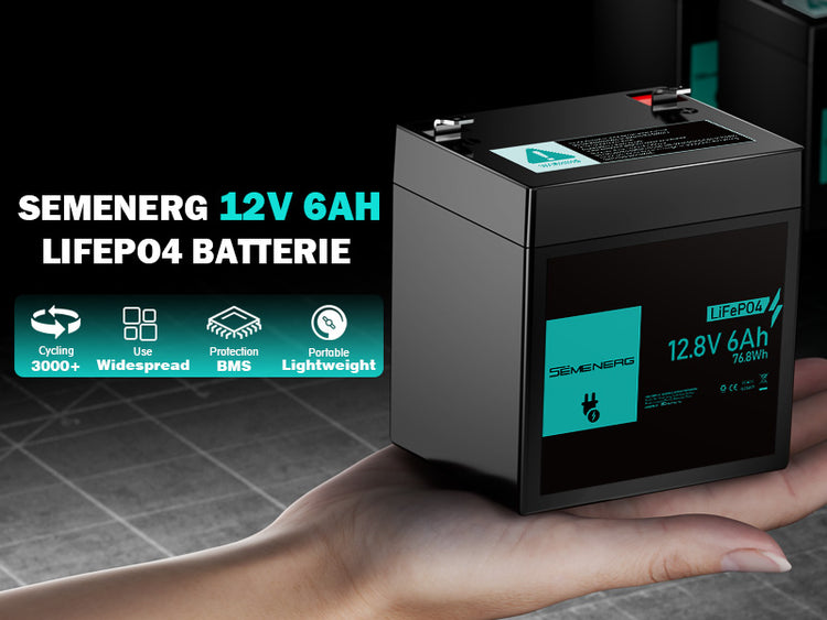 Semenerg 12V 6Ah LiFePO4 battery held in a hand with product details displayed.